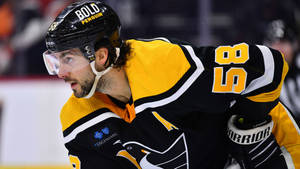 Kris Letang Skilled Hockey Player Wallpaper