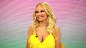 Kristin Chenoweth Strikes A Pose In Stunning Attire Wallpaper