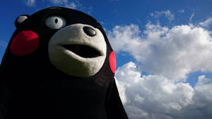 Kumamon Mascot Under The Sky Wallpaper