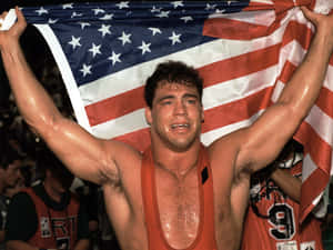 Kurt Angle Celebrating His Olympic Gold Medal Win Wallpaper