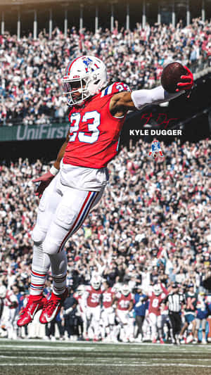 Kyle Dugger Leaping Catch Football Game Wallpaper