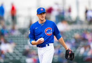 Kyle Hendricks In Blue And White Uniform Wallpaper