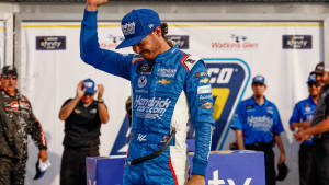 Kyle Larson Bowing His Head Wallpaper