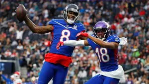 Kyle Pitts Catching Football During Game Wallpaper