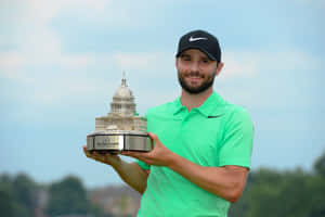 Kyle Stanley Holding A Golf Trophy Wallpaper