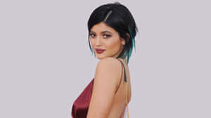 Kylie Jenner Stuns In A Fabulous Pink Outfit Wallpaper