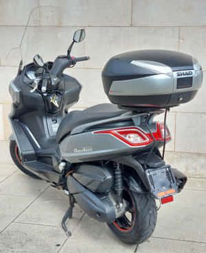 Kymco Downtown Scooterwith Top Case Wallpaper