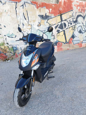 Kymco Scooter Against Graffiti Wall Wallpaper