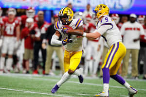 L S U_ Football_ Handoff_ Play Wallpaper