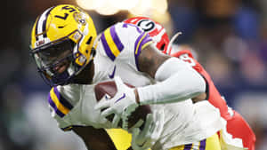 L S U Football Player Catching Ball Wallpaper