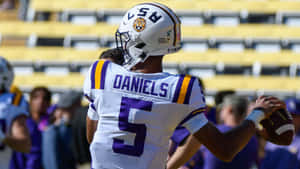 L S U Quarterback Jayden Daniels Number5 Wallpaper