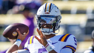 L S U Quarterback Preparesto Throw Wallpaper