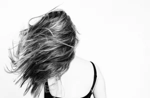 Lady's Exceptional Windblown Hair Wallpaper