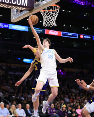 Lakers Player Austin Reaves Layup Action Wallpaper