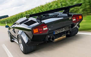 Lamborghini Countach Glows In The Night Wallpaper