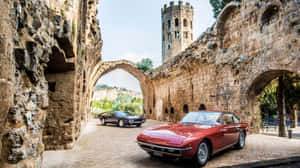 Lamborghini Islero Pair Castle Backdrop Wallpaper