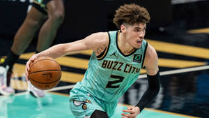 Lamelo Ball Running With Ball Wallpaper