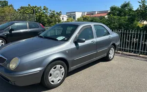 Lancia Lybra Parked Outdoors Wallpaper