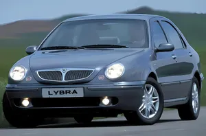 Lancia Lybra Sedan On The Road Wallpaper