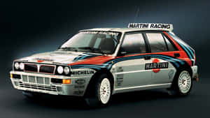 Lancia's Bold And Stylish Ride On The Road Wallpaper