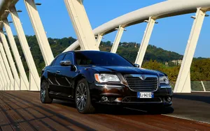 Lancia Thema Black Sedanon Bridge Wallpaper