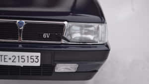 Lancia Thema Front Grilleand Headlight Wallpaper