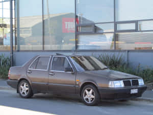 Lancia Thema Parkedon Street Wallpaper