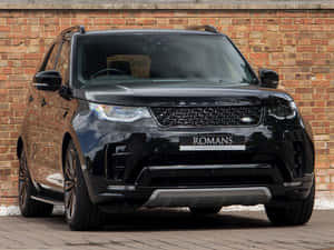 Land Rover Discovery Off-roading In Nature Wallpaper