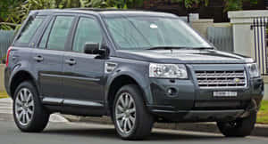 Land Rover Freelander In A Stunning Off-road Setting Wallpaper