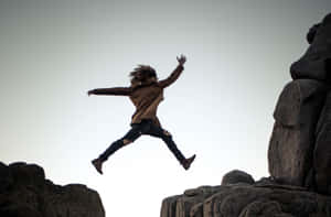 Languishing Woman On The Cliff Wallpaper