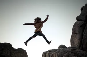 Languishing Woman On The Cliff Wallpaper