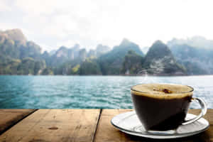 Last Light Of The Day Cascading Over A White Sand Beach Wallpaper