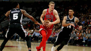 Lauri Markkanen With Murray And Mitchell Nba Finals Wallpaper