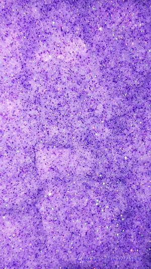 Lavish Light Purple Iphone Adorned With Sparkling Violet Glitters Wallpaper