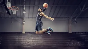 Le Bron_ James_ Airborne_ Dunk Wallpaper