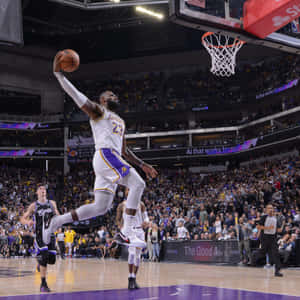 Le Bron_ James_ Soaring_ Dunk_ Lakers_ Game Wallpaper