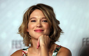 Lea Seydoux At A Press Conference Wallpaper