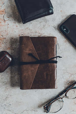 Leather Walletand Accessories Flatlay Wallpaper