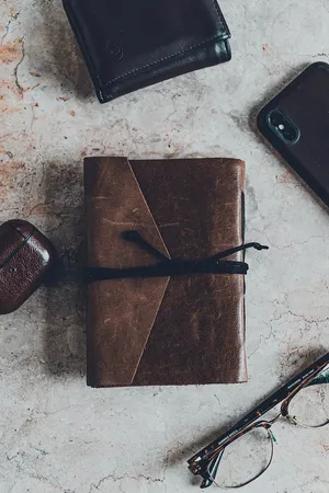 Leather Walletand Accessories Flatlay Wallpaper