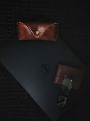 Leather Walletand Accessorieson Desk Wallpaper