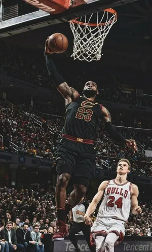 Lebron James Showcasing Skill On Iphone Wallpaper Wallpaper