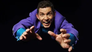 Lee Evans Performing On Stage Wallpaper