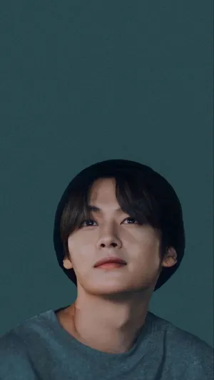 Lee Know Contemplative Gaze Portrait Wallpaper