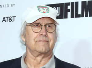 Legendary Actor Chevy Chase In Classic Pose Wallpaper