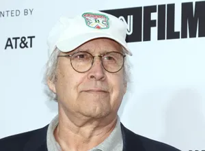 Legendary Actor Chevy Chase In Classic Pose Wallpaper