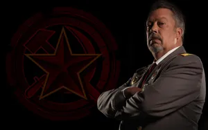 Legendary Actor Tim Curry In An Iconic Pose Wallpaper