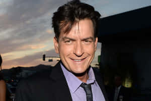 Legendary Charlie Sheen - A Snapshot From The Past Wallpaper