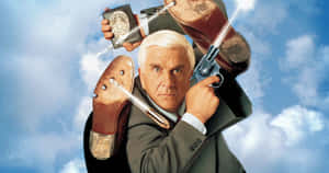 Legendary Comedian Leslie Nielsen In A Candid Pose. Wallpaper