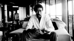 Legendary Comedian Richard Pryor In Performance Wallpaper