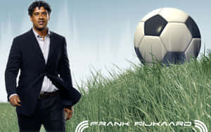 Legendary Football Manager Frank Rijkaard Poster Wallpaper